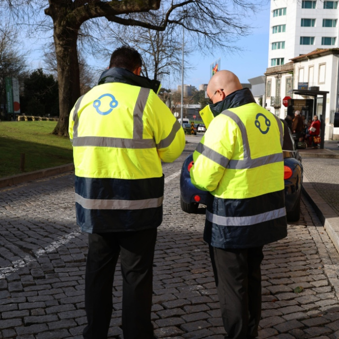 two men monitoring illegal parking